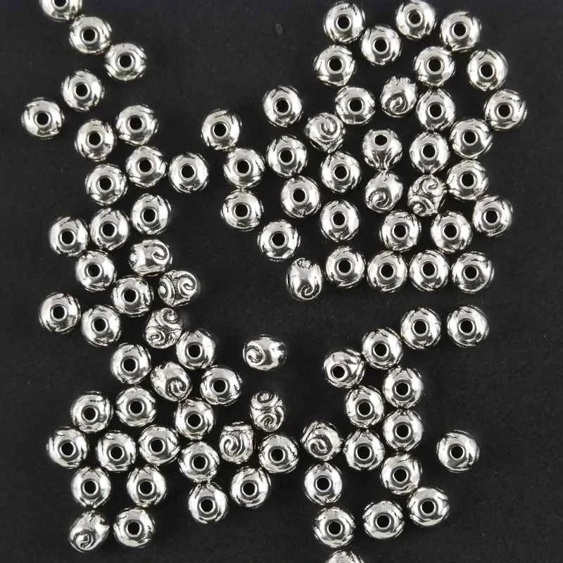 Kovová kulička 5,5x4,5mm